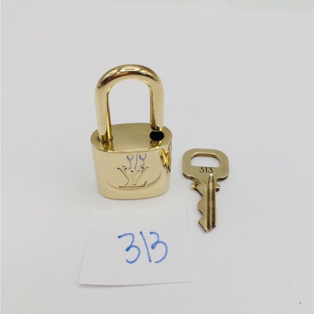 Authentic Louis Vuitton Lock and key 313